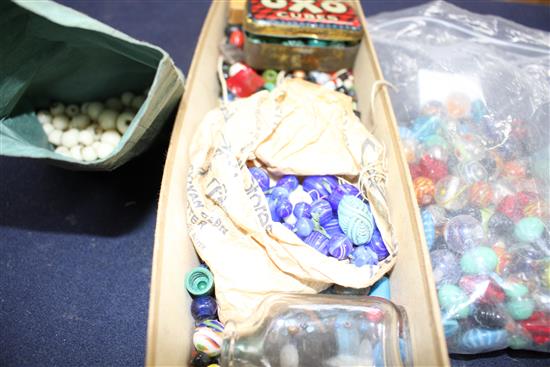 A quantity of old and antique glass beads, many in the style of marbles